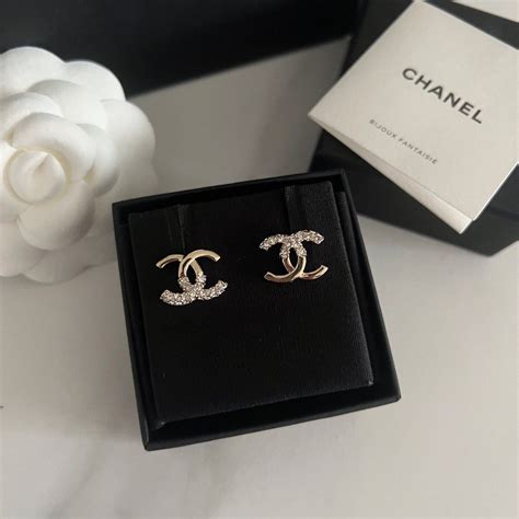 chanel 22k earrings|Chanel ring earrings.